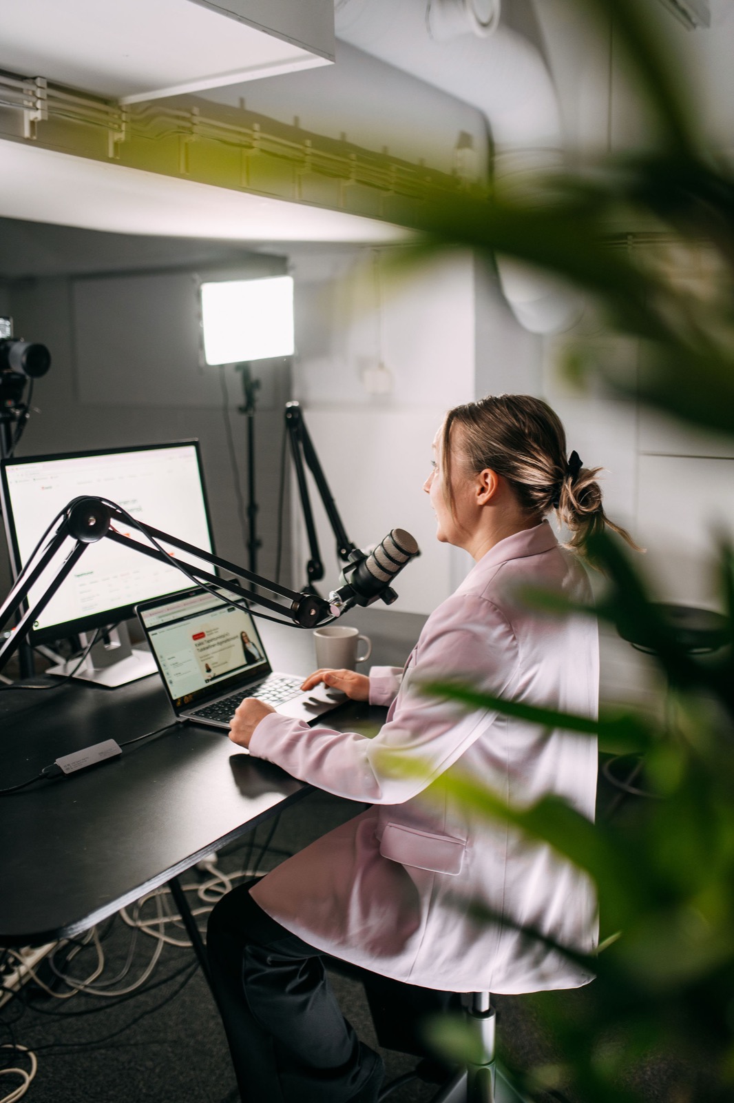 A CompetenceFlow team member working in the webinar studio at the Oulu office in Finland